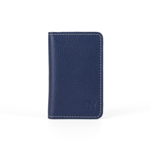 Everyday Card Holder, Alpine Blue, front view: pebble-grain blue leather, contrast stitching, ELV monogram debossed near the bottom edge.