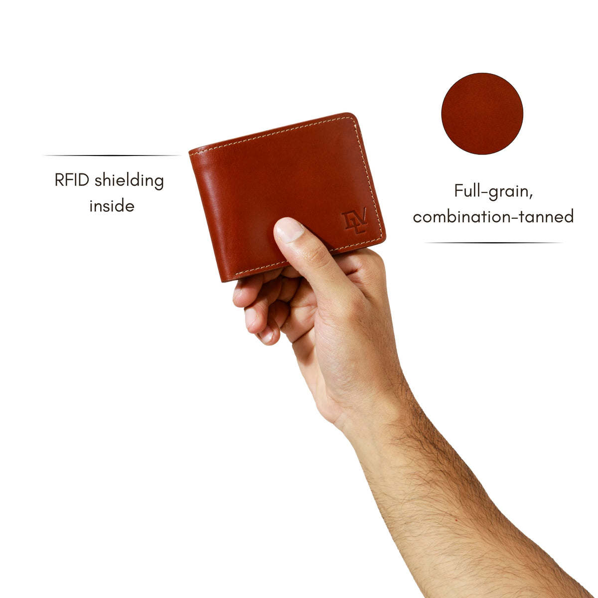 Classic Bifold in Rosata Tan held in one hand. Notes: RFID shielding inside; full-grain, combination-tanned leather.