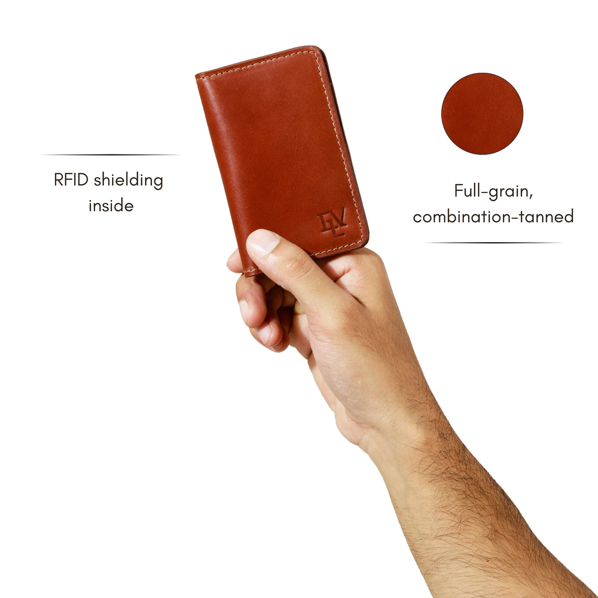Minimal Card Holder in Rosata Tan held in one hand. Notes: RFID shielding inside; full-grain, combination-tanned leather.
